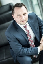 Tomasz Czuba, JLL